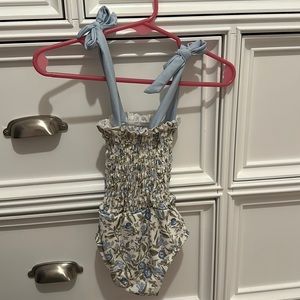 Bathing suit, starting out is the brand